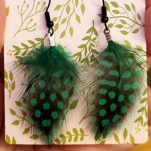 Classic green & black feather drop handmade earrings. $Firm.